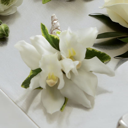 White Mini Cymbidium Boutonniere –  Vanessa Florist Corp, Brooklyn NY